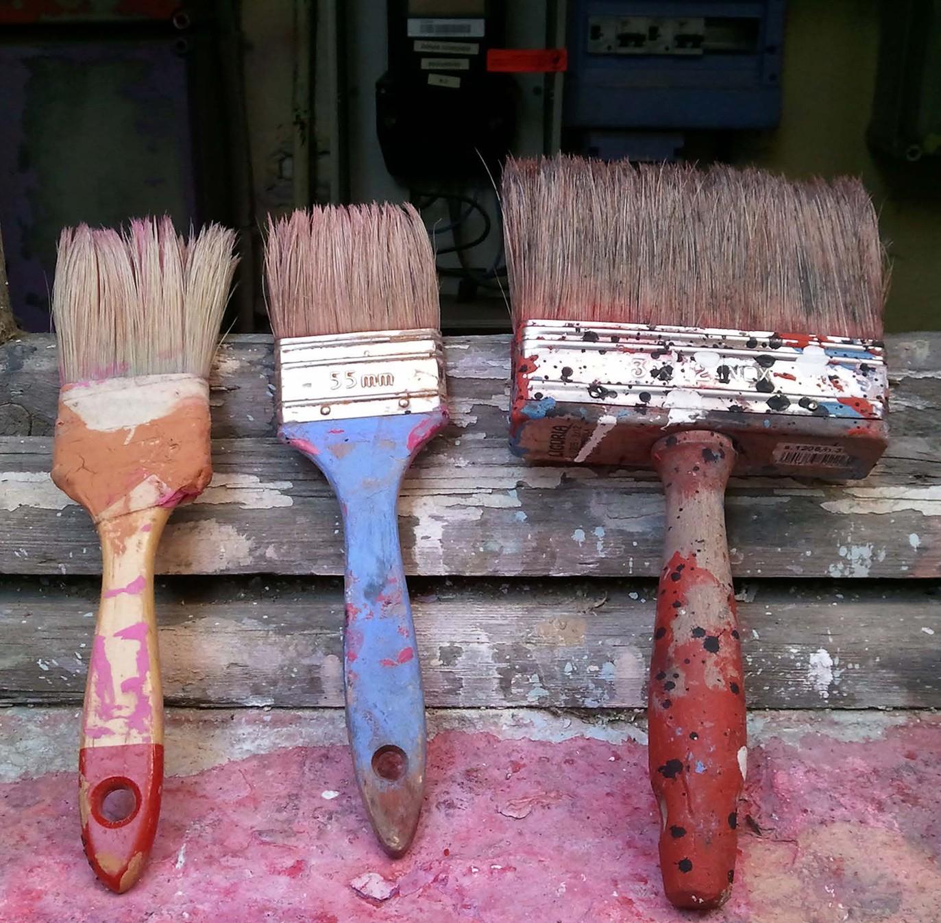 Paintbrushes in the artist's studio.