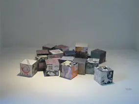 Artwork in Objects in Boxes, a series by Desislava Deneva (DEDE).